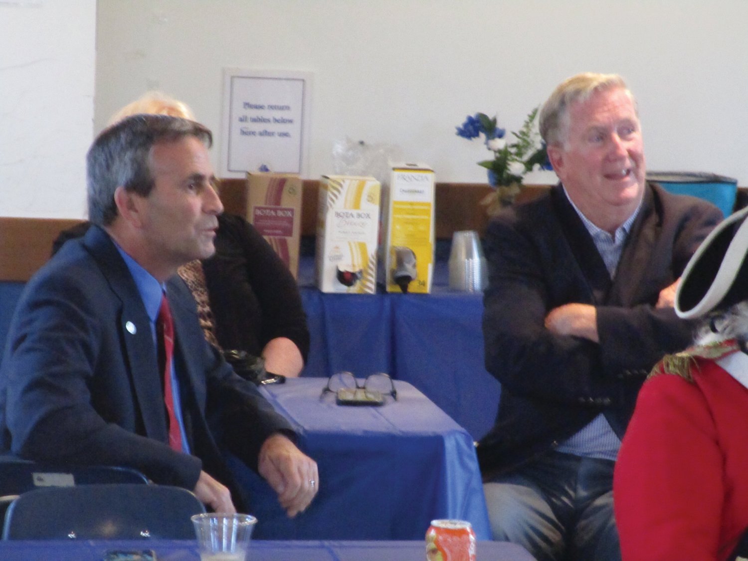 TALE OF TWO CITIES: Warwick Mayor Frank Picozzi, left, and Cranston Mayor Ken Hopkins look on during last week’s installation ceremony for the Gaspee Days Committee.